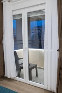 Balkoni atau teres di M Corner