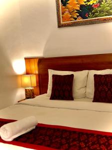 Postel nebo postele na pokoji v ubytování Intan Guest House