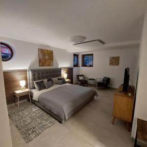 Postel nebo postele na pokoji v ubytování Apartmány FELSENBURG Staré Splavy