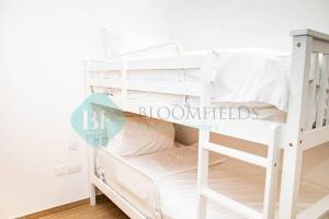 Bloomfields Mayan 3br Beach Access Yas Island客房内的一张或多张床位