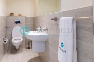 Koupelna v ubytování Bloomfields Stylish 1br In Oasis Masdar City