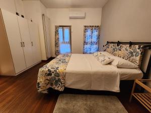 Postel nebo postele na pokoji v ubytování La Corte Guesthouse