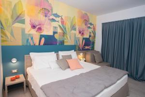 Cama ou camas em um quarto em Hotel President