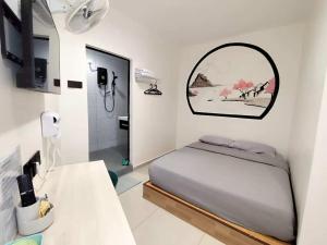 Postel nebo postele na pokoji v ubytování MUSANG ONG HOTEL + 37 fotografií