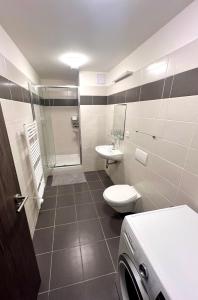 Koupelna v ubytování Apartmány Chodské námésti