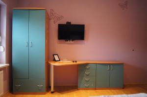 TV a/nebo společenská místnost v ubytování Apartment Šilec