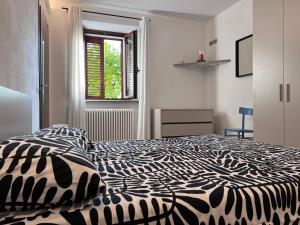 Ένα ή περισσότερα κρεβάτια σε δωμάτιο στο Casa Orlandina