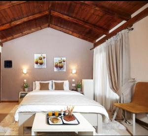Postel nebo postele na pokoji v ubytování Asimina Guesthouse, Eptalofos Parnassos