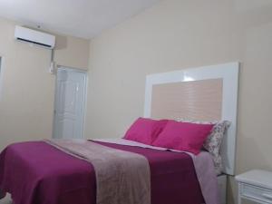 Ένα ή περισσότερα κρεβάτια σε δωμάτιο στο Apartahotel-E vista catalina