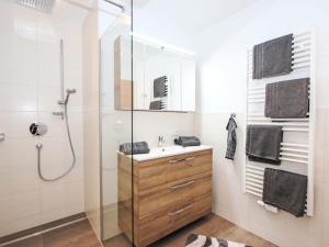 A bathroom at Apartment Dengg by Interhome