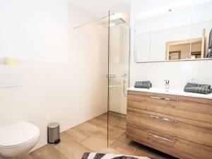 A bathroom at Apartment Dengg by Interhome
