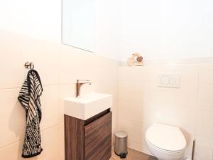 A bathroom at Apartment Dengg by Interhome