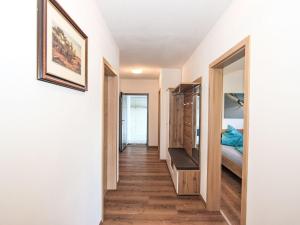 A bed or beds in a room at Apartment Dengg by Interhome
