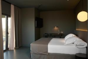 Letto o letti in una camera di Barcelona Princess