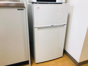 Köök või kööginurk majutusasutuses 桜並木と航空公園の近くにある閑静なお部屋 最大5名 t10