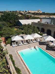 Bazén v ubytování The Xara Palace Relais & Chateaux nebo v jeho okolí
