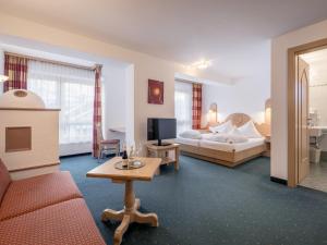 Postel nebo postele na pokoji v ubytování Hotel Garni Europa + 37 fotografií
