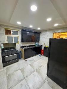 Η κουζίνα ή μικρή κουζίνα στο Luxury Apartment Tree Nile