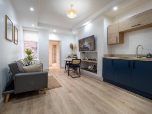 Η κουζίνα ή μικρή κουζίνα στο Boho Flat New Brighton, free WiFi and parking +19 φωτογραφίες