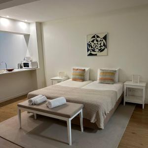 Postel nebo postele na pokoji v ubytování Apartments VMadeira