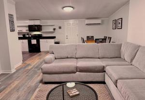 a living room with a couch and a table at New And Spacious. Pets Yes in Beaufort
