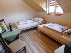 Postel nebo postele na pokoji v ubytování Apartamenty Polańczyk