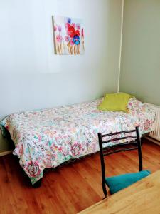 Postel nebo postele na pokoji v ubytování Residencial HITAPUHAN