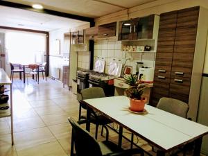 Kuchyň nebo kuchyňský kout v ubytování Residencial HITAPUHAN