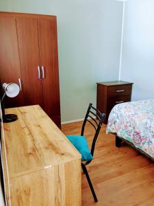 Postel nebo postele na pokoji v ubytování Residencial HITAPUHAN