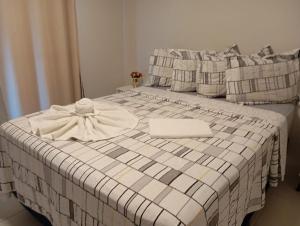 En eller flere senge i et værelse på Praimar