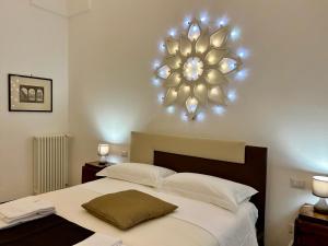A bed or beds in a room at B&B Don Alessandro