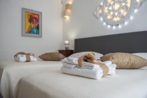 A bed or beds in a room at B&B Don Alessandro