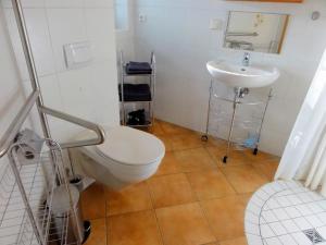 Et badeværelse på Ferienwohnung Sonnenschein