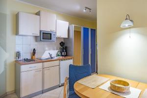 Køkken eller tekøkken på Ferienwohnung Sonnenschein