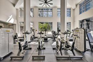 a gym with cardio machines and treadmills at Global Luxury Suites Midtown Atlanta in Atlanta