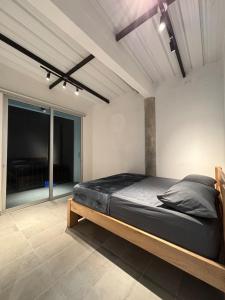Una cama o camas en una habitación de Villa Entre Nubes