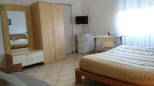 Postel nebo postele na pokoji v ubytování B&B Ore Liete