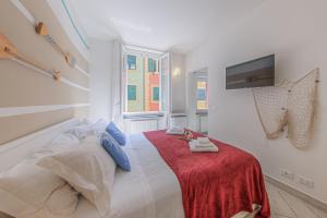 Postel nebo postele na pokoji v ubytování BRAND APARTMENT Vivi il Centro di Portofino