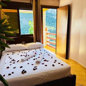 Postel nebo postele na pokoji v ubytování Hotel nabil