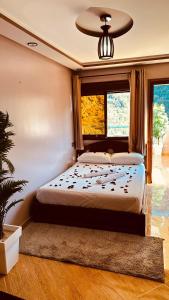 Postel nebo postele na pokoji v ubytování Hotel nabil