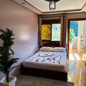 Postel nebo postele na pokoji v ubytování Hotel nabil