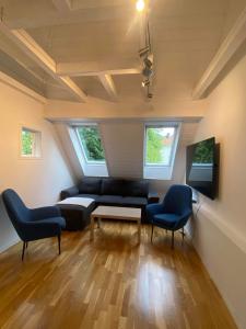 Μια τηλεόραση ή/και κέντρο ψυχαγωγίας στο Apartment near Bergen Sentrum for up to 8 people