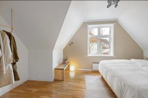 Ένα ή περισσότερα κρεβάτια σε δωμάτιο στο Apartment near Bergen Sentrum for up to 8 people