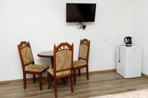 TV a/nebo společenská místnost v ubytování Gostyniy Dvir Synevir