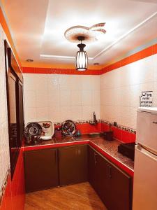 Kuchyň nebo kuchyňský kout v ubytování Hotel nabil