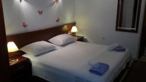 Ein Bett oder Betten in einem Zimmer der Unterkunft Studio Andrea
