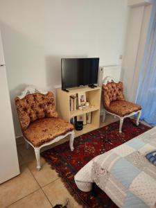 TV a/nebo společenská místnost v ubytování Chrisa's apartment