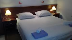 Ein Bett oder Betten in einem Zimmer der Unterkunft Studio Andrea
