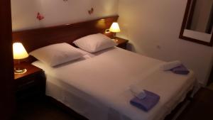 Ein Bett oder Betten in einem Zimmer der Unterkunft Studio Andrea