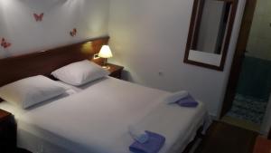 Ein Bett oder Betten in einem Zimmer der Unterkunft Studio Andrea